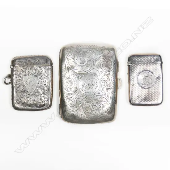 Two sterling silver vesta and a silver cigarette case, all dented. Total 105gm