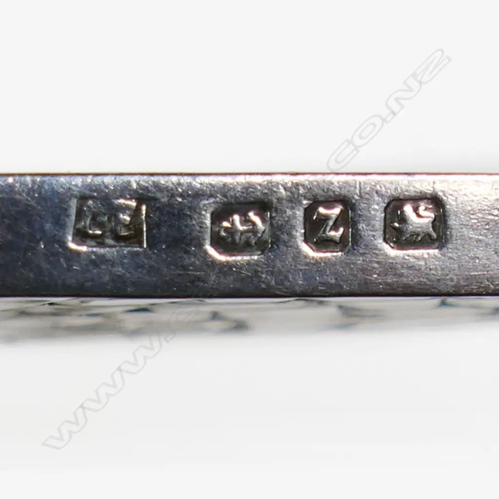 A late Victorian sterling silver notepad with four ivorine leaves, Birmingham 1899 by Lawrence Emanuel, on silver plate albertina; along with a sterling silver compact Birmingham 1926 by A.L. Denninson, mirror inside lid, press fitting frame to hold commercial powder cakes. Image 1++