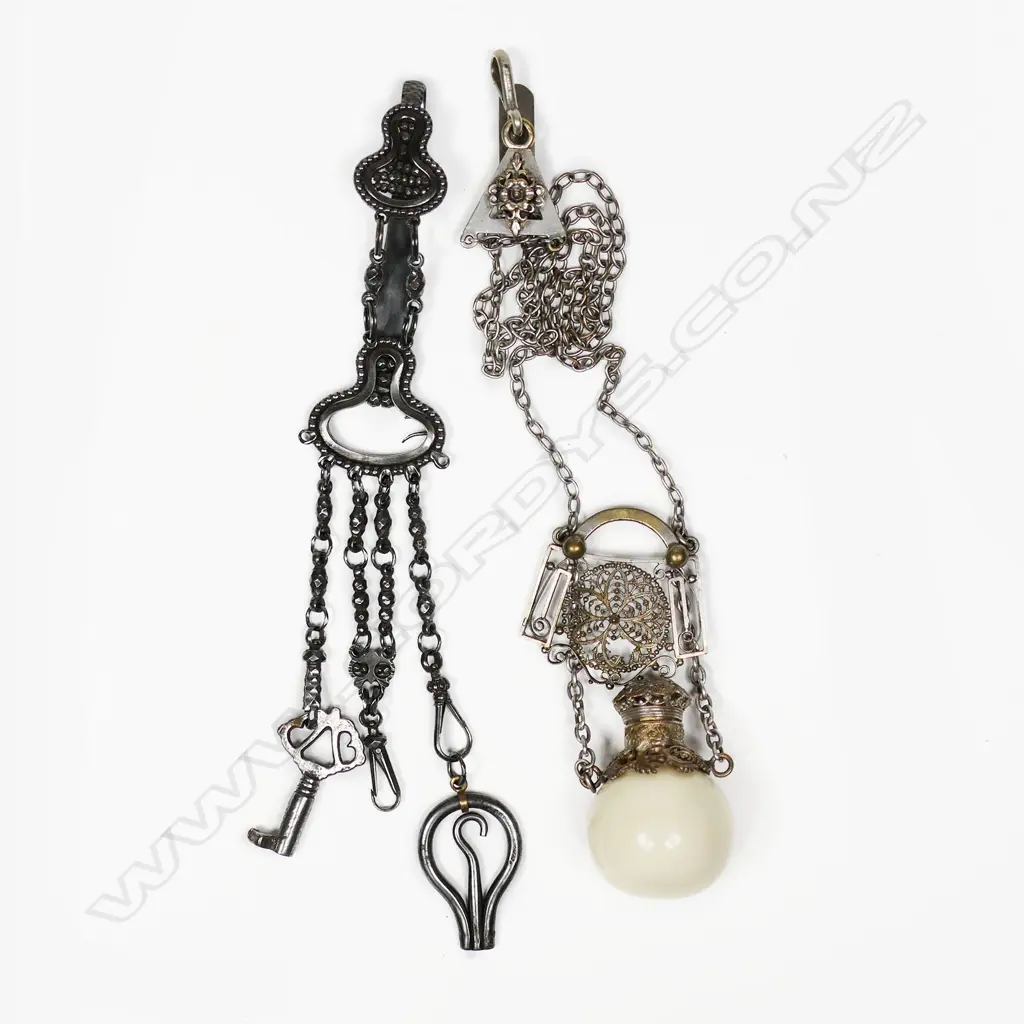 A cut steel small chatelaine and another. Image 1++