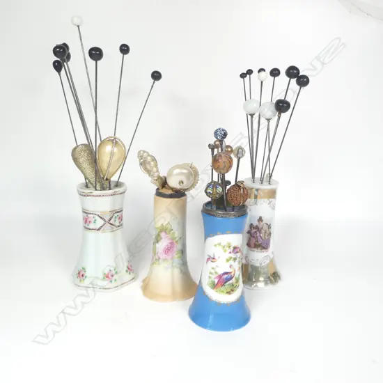 Four porcelain hat pin stands and collection of hat pins