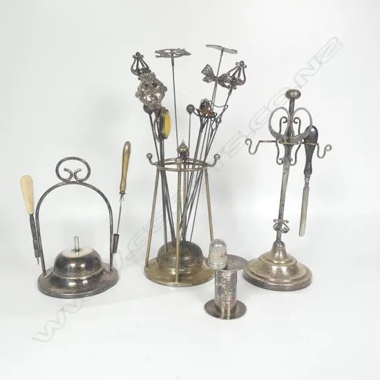 Silver plated hat pin stand, hat pins, manicure stand and a sewing stand