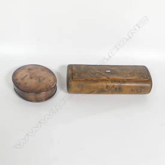 Large figured walnut snuff box with horn lining, and a copper pocket snuff box, the long walnut box with integral hinged lid inset with small mother of pearl cartouche. L.120mm
