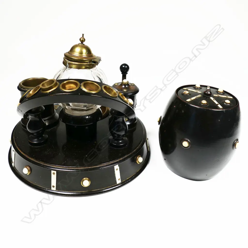 A treen smoker's stand incorporating a glass snuff bottle, and a tobacco barrel with conforming decoration. Stand Dia.180mm Image 1++