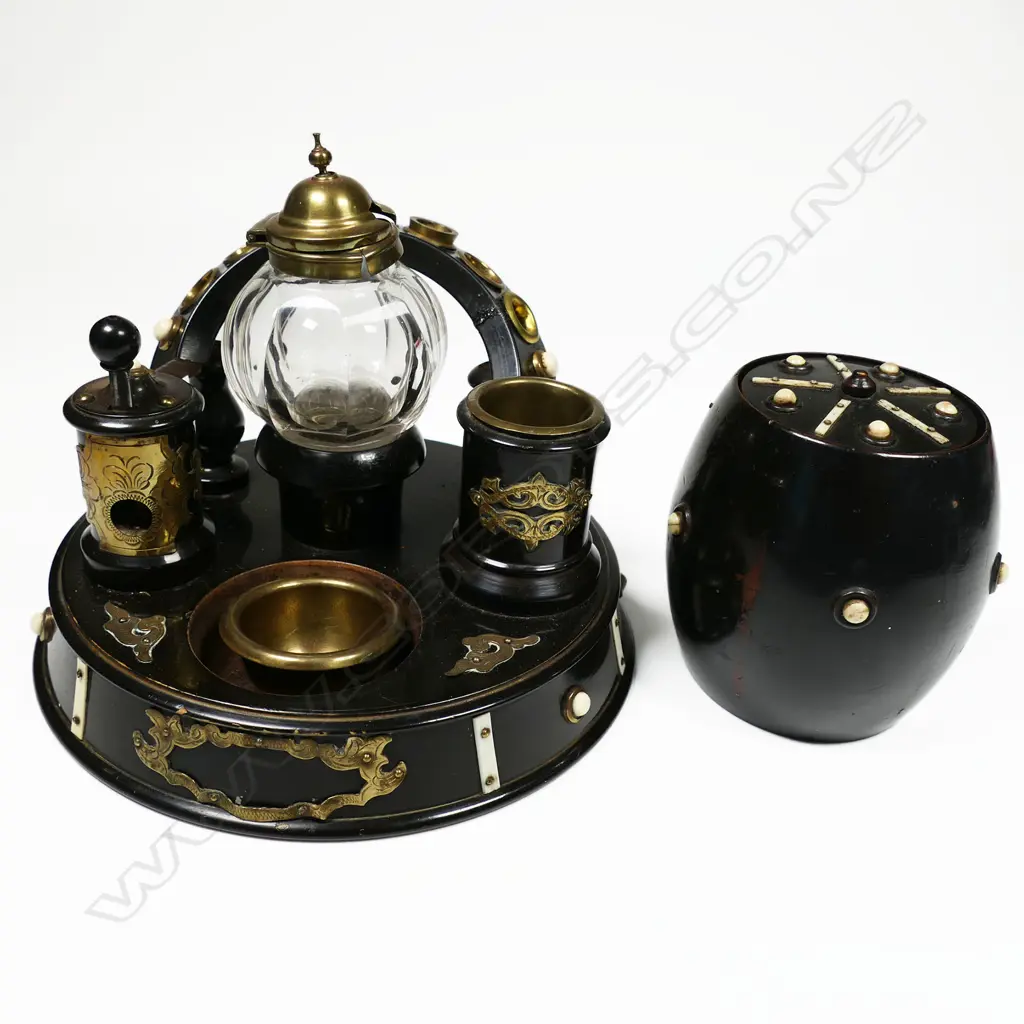 A treen smoker's stand incorporating a glass snuff bottle, and a tobacco barrel with conforming decoration. Stand Dia.180mm Image 1++