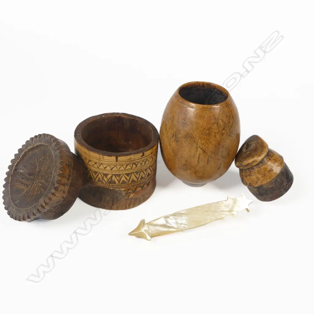 A Timorese tobacco box; a Suluwesi betel box and a Solomon Islands pearl shell lure shank. Image 1++