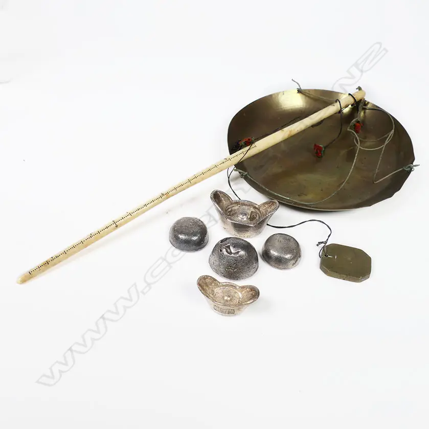 A Chinese steelyard type scale and five variously marked silver tael weights Image 1++