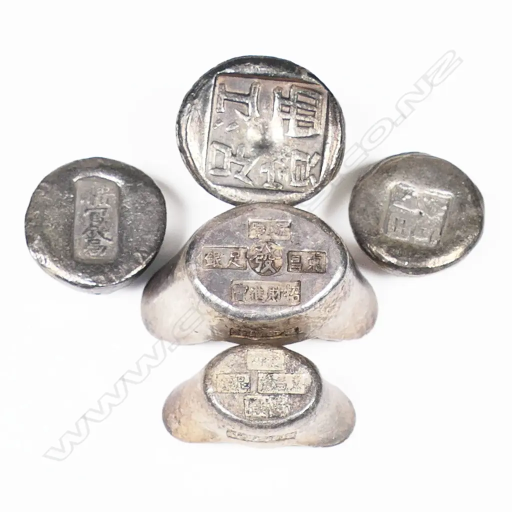 A Chinese steelyard type scale and five variously marked silver tael weights Image 1++