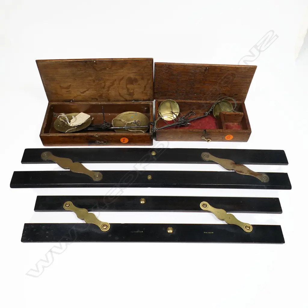 Two ebony and brass parallel rules, with two small boxed portable balance scales. Image 1++