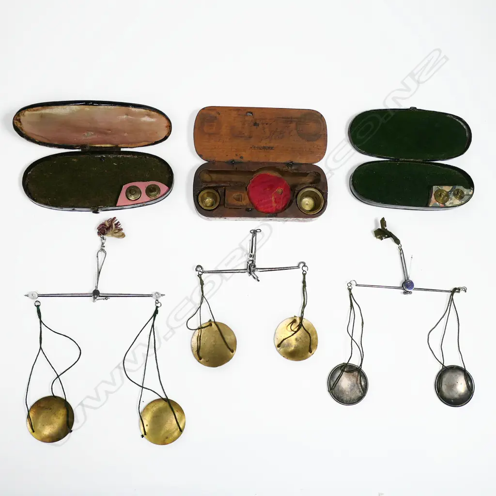 Three sets of small portable balance scales, two in lacquered tin cases. Image 1++