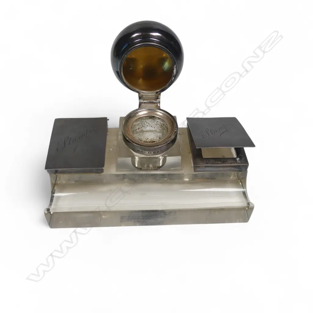 A silver and glass desk top standish with central inkwell flanked by two stamp boxes, London 1922, Image 1++