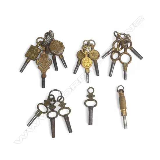 16 various pocket watch keys, two with plaques marked for NZ watchmakers.