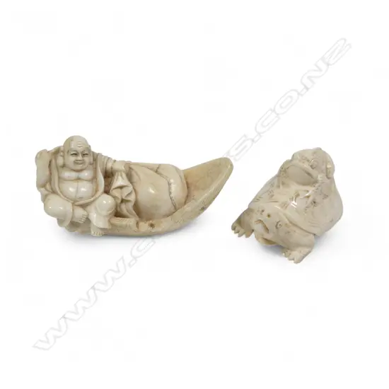 Two small Japanese ivory netsuke - Hotei with treasure sack adrift in a boat (AF), and a frog riding on the back of a tortoise. Both signed.