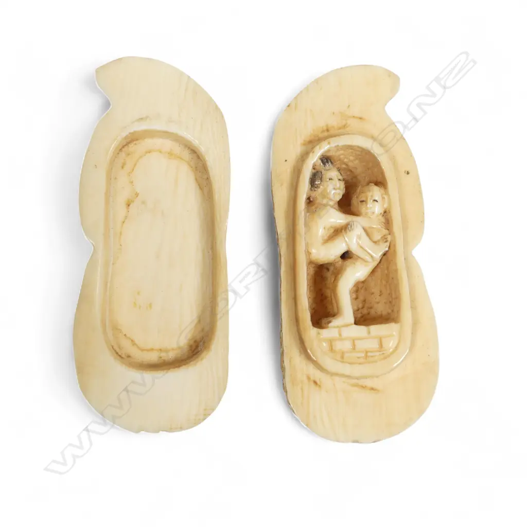 An ivory erotica carved as a groundnut shell, finely joined as two halves revealing a couple in coitus to the interior. H.65mm Image 1++