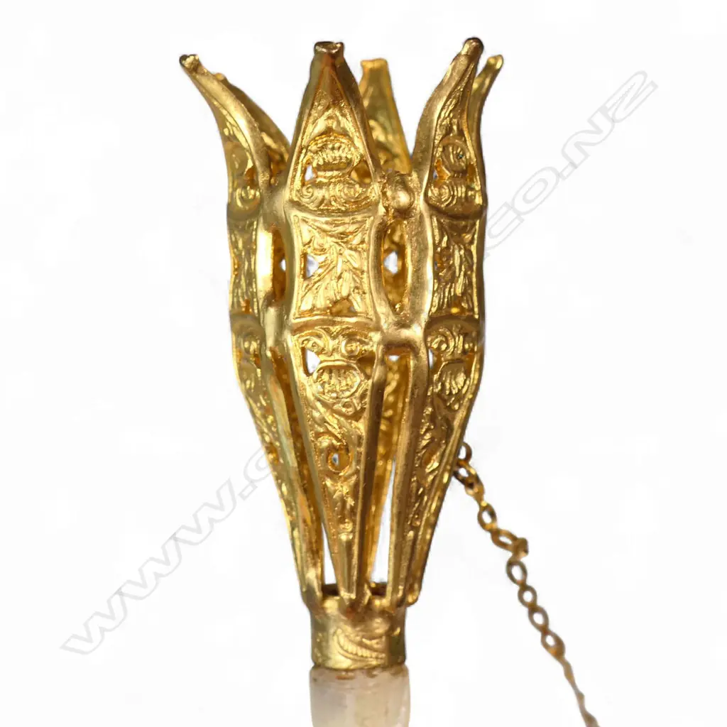 A small French 19th century posy holder, gilded basket on a turned mother of pearl handle with finger ring chain and chained pin. H.90mm Image 1++