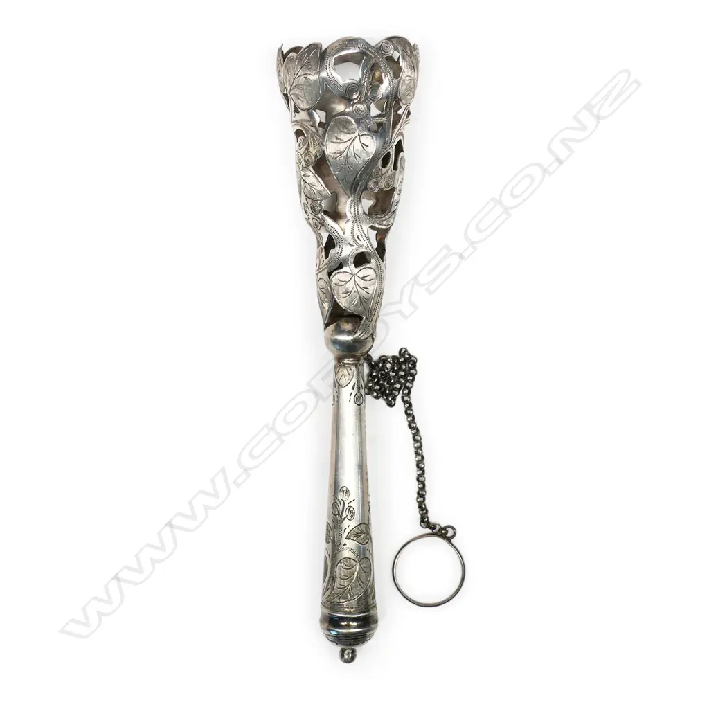 An Edwardian silver plated tussie-mussie of bouquet holder, the cone pierced and engraved with ivy leaves, on a tapering handle with conforming engraving. H.160mm Image 1++