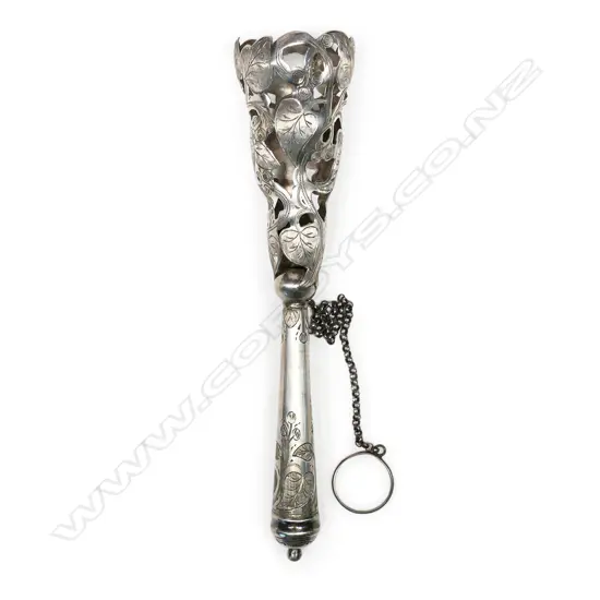 An Edwardian silver plated tussie-mussie of bouquet holder, the cone pierced and engraved with ivy leaves, on a tapering handle with conforming engraving. H.160mm