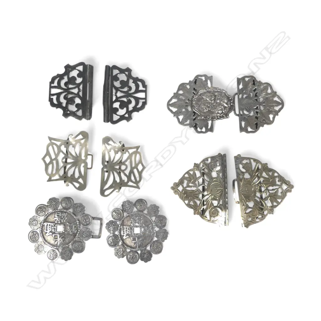 Four silver plated two-pice sash belt buckles and a two-piece Chinese silver belt buckle with Qing Guangxu Tongbao coin design to the centre Image 1++