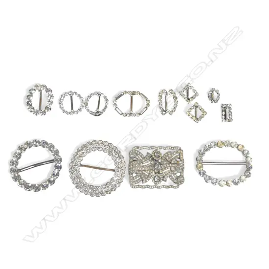 nine vintage diamanté sash choker or scarf buckles on a card; three larger diamanté buckles and a German Art Deco paste brooch