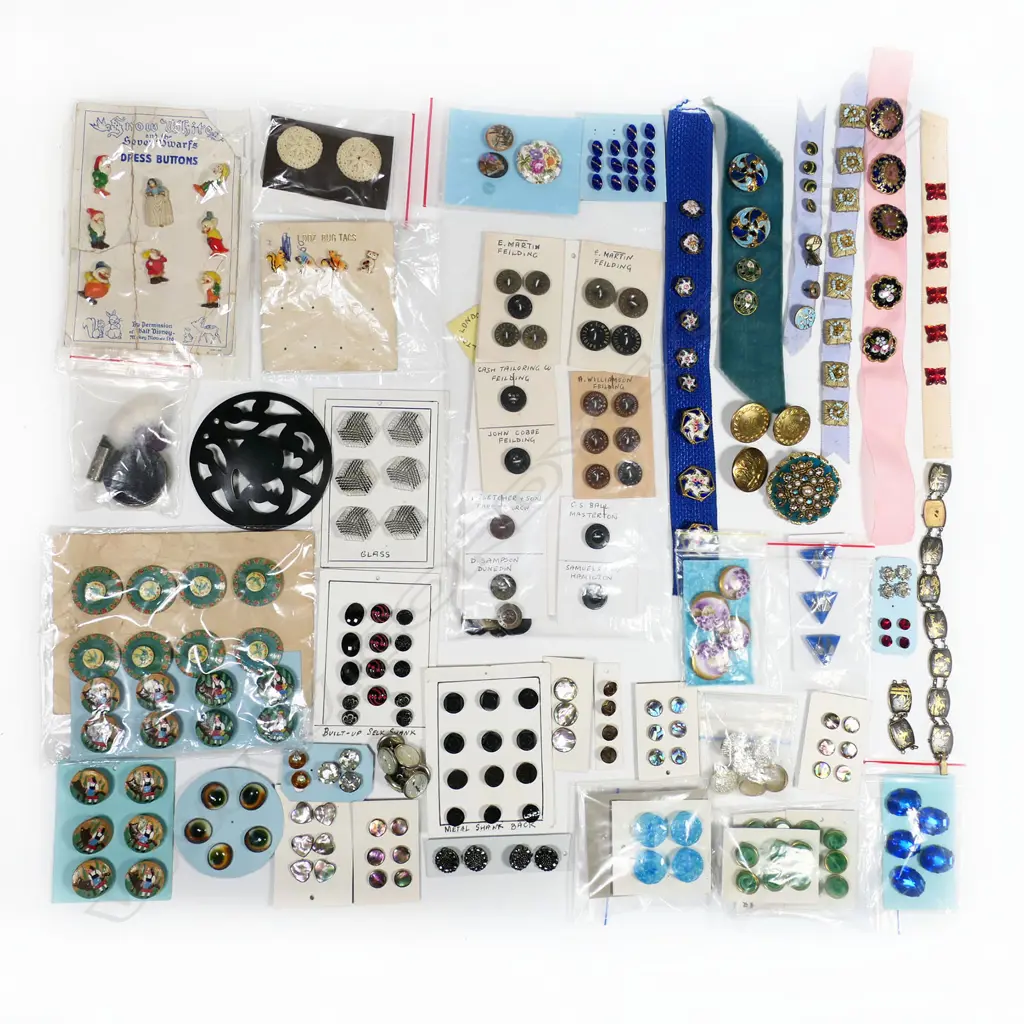Two trays of various fancy enamel and other sew on and detachable buttons Image 1++