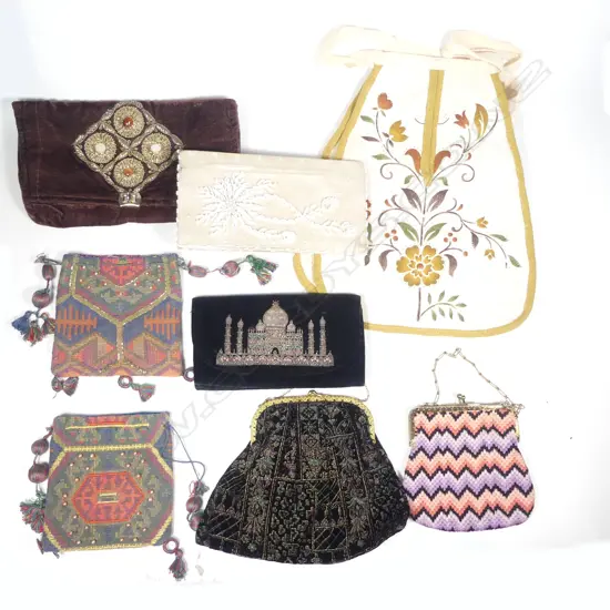 A selection of eight various purses.
