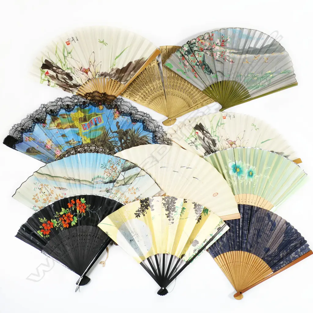 A collection of folding paper and other fans Image 1++