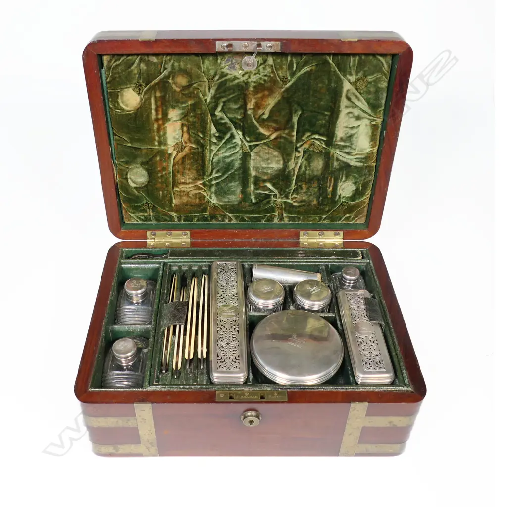 A good George IV period brass bound mahogany gentleman's dressing case by Thomas Briggs* 27 Piccadilly, London, with sterling silver capped cut crystal bottles and jars by John & Archibald Douglas, London 1825, Image 1++