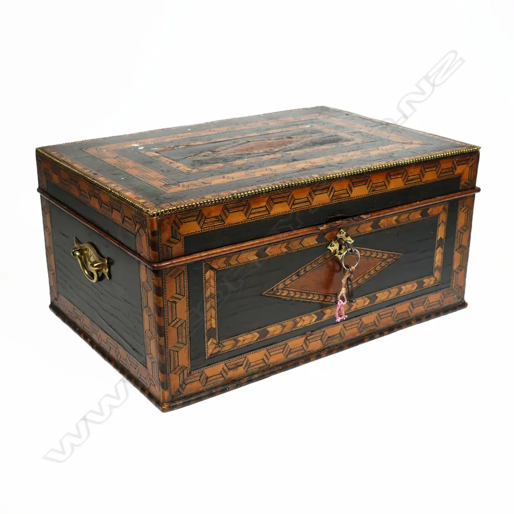 An ornate 19thC Tunbridge ware work box, with multiple chevron and ribbon bands to the top and walls. The interior with lidded compartments to a removeable top tier. The lower tier with a lift out tray flanked by drawers. With keys. 330 x 220 x 155mm Image 1++