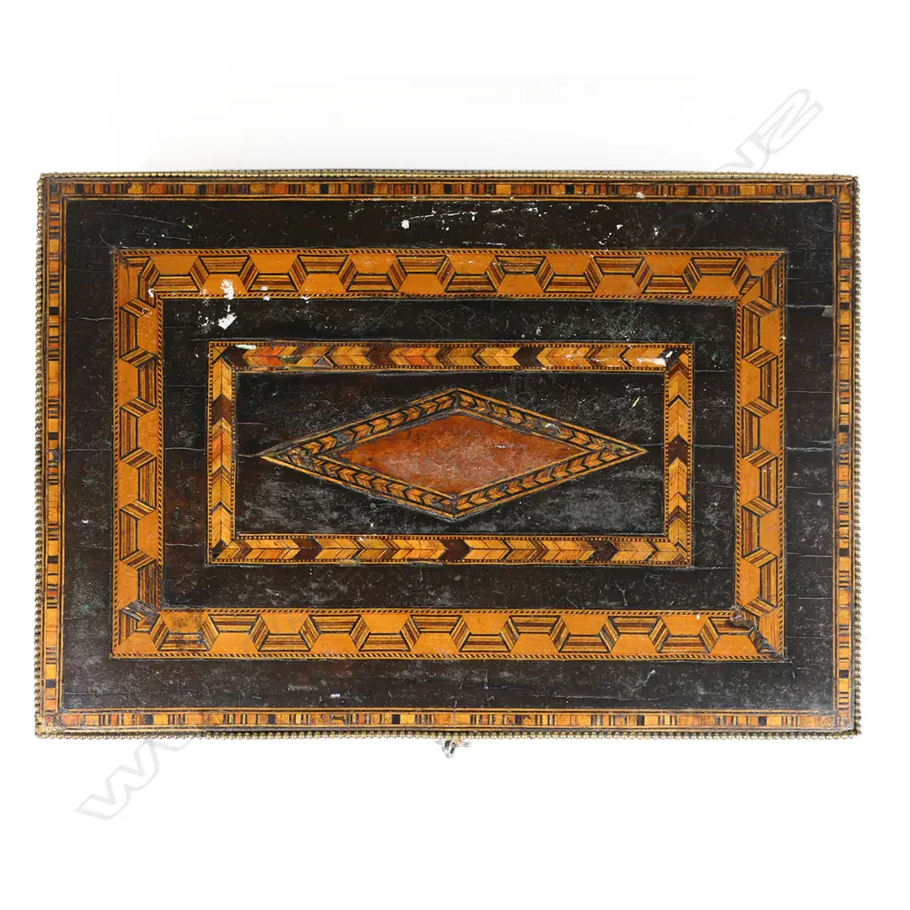 An ornate 19thC Tunbridge ware work box, with multiple chevron and ribbon bands to the top and walls. The interior with lidded compartments to a removeable top tier. The lower tier with a lift out tray flanked by drawers. With keys. 330 x 220 x 155mm Image 1++