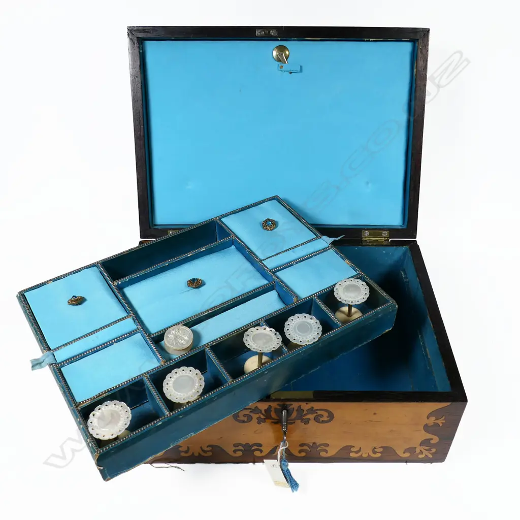 A Victorian maple and rosewood marquetry veneered workbox, relined with silk and containing mother-of-pearl bobbins, Image 1++