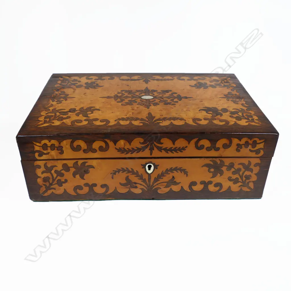 A Victorian birdseye maple and rosewood marquetry veneered workbox, with a symmetrical floral silhouette pattern. With key. 350 x 235 x 120mm Image 1++