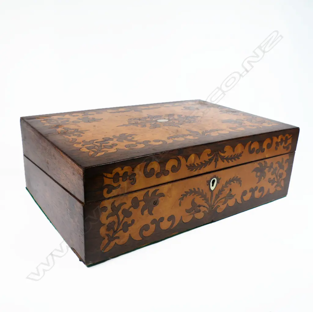 A Victorian birdseye maple and rosewood marquetry veneered workbox, with a symmetrical floral silhouette pattern. With key. 350 x 235 x 120mm Image 1++