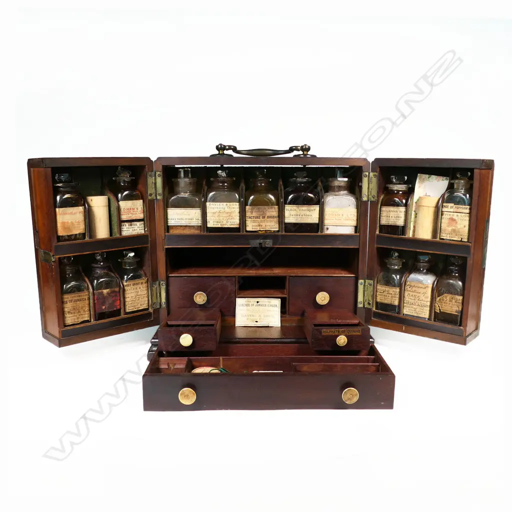 A good 19thC Cuban mahogany apothecary box, of plain oblong section with top brass bale handle and raised on ogee bracket feet, Image 1++