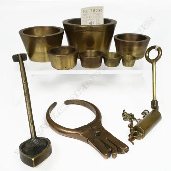 Conductor's ticket punch; set seven brass bucket weights ¼oz-16oz Troy; armourer's barrel inspection tool; and brass foundry sand moulding tool.