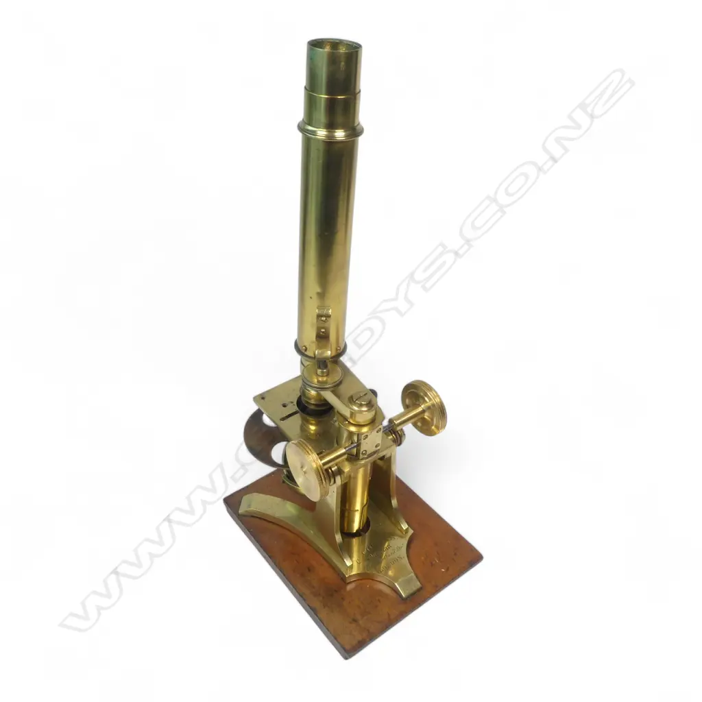 A 19thC brass monocular microscope by Charles Collins, Optician, 157 Gt. Portland St., London, Image 1++