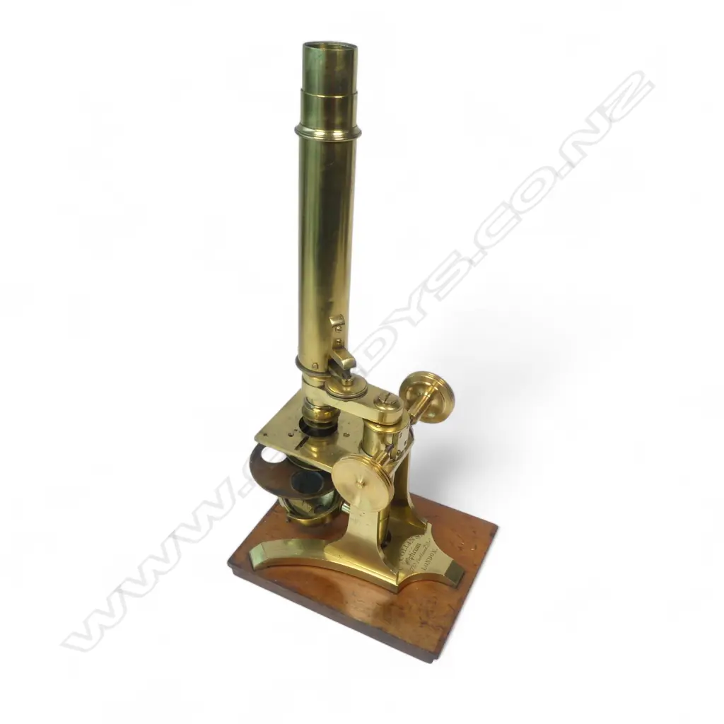 A 19thC brass monocular microscope by Charles Collins, Optician, 157 Gt. Portland St., London, Image 1++