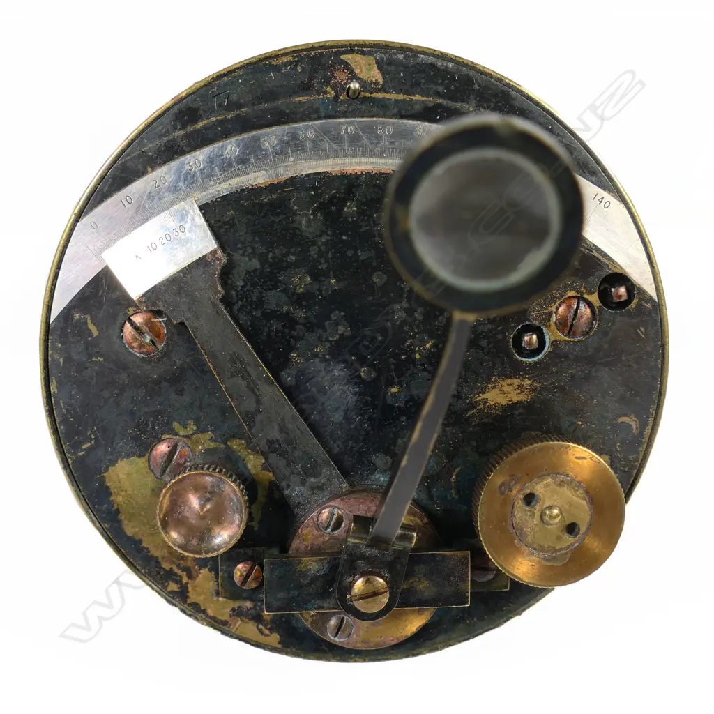 A blackened brass drum or pocket sextant by F Barker & Son, London, with silver scale from -5º to 140º, vernier from 0º to 30º, hinged and swivelling scale magnifier. Dia.80mm. Image 1++