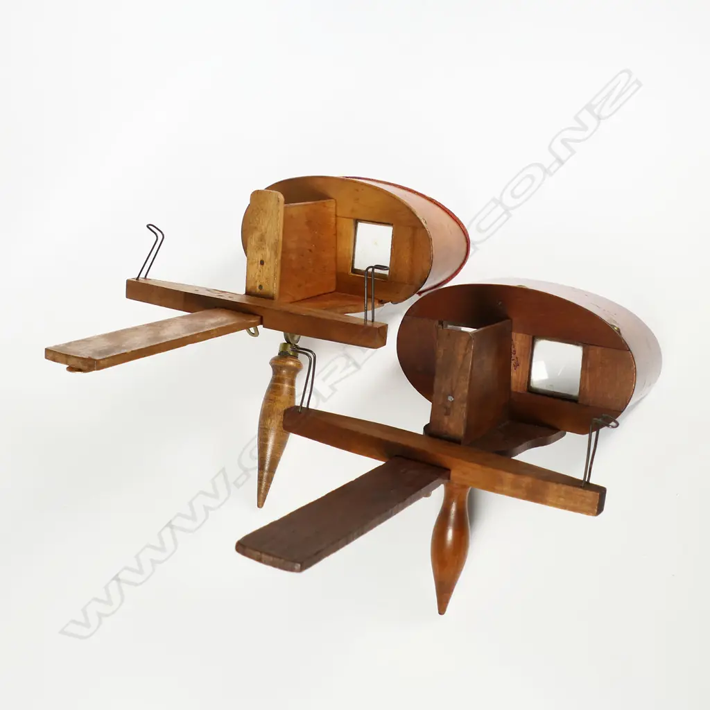 Two beech hand held stereoscopic viewers. Image 1++