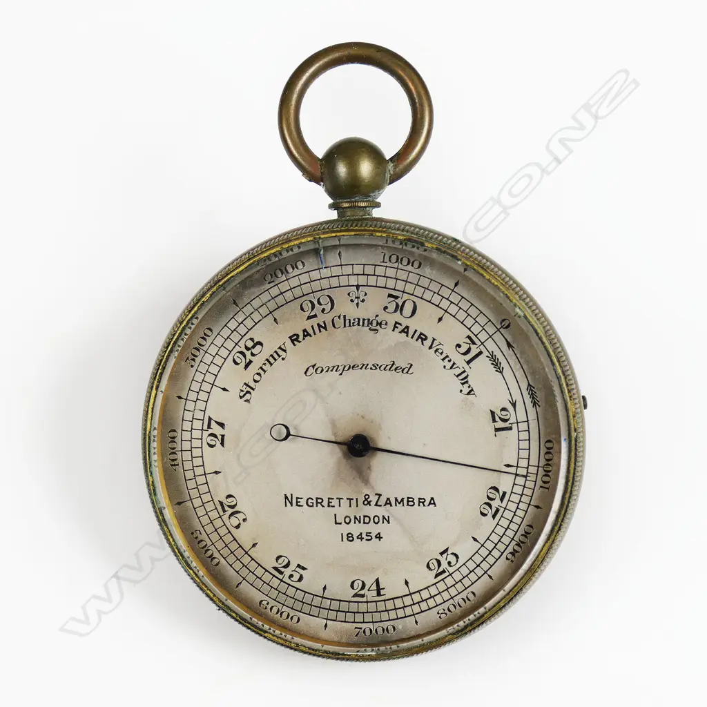 A brass cased compensated pocket barometer-altimeter by Negretti & Zambra, London, No.18454, c.1875 Image 1++