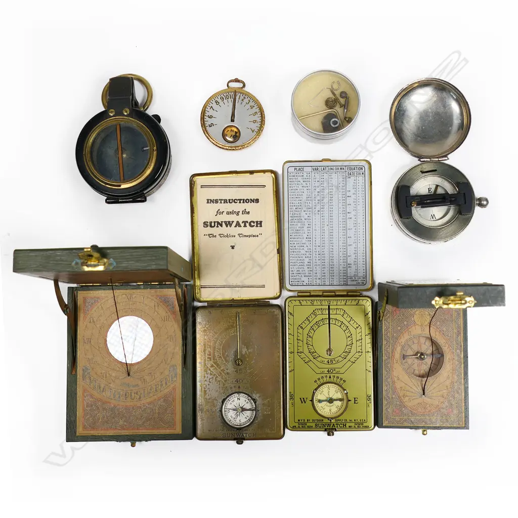 Two modern portable sundials; two tin cased 'Sunwatches'; WWI Verner's compass case parts only; other compass parts. Image 1++
