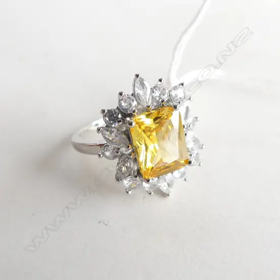 FAUX CITRINE AND WHITE STONE  RING IN SILVER PLATE