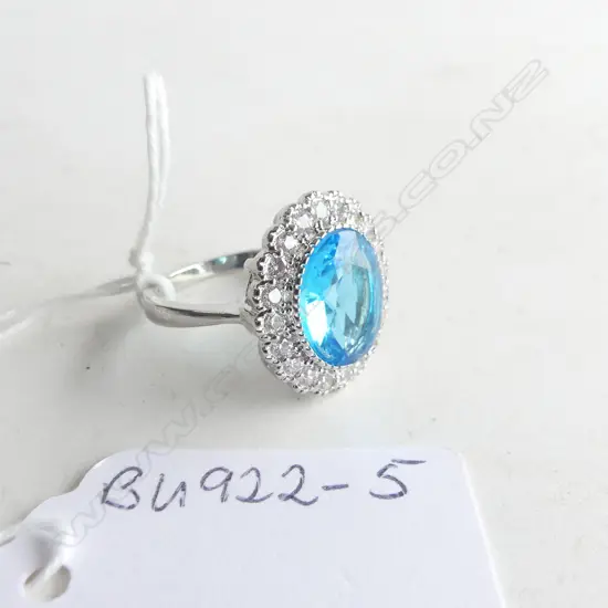 FAUX BLUE ZIRCON AND FAUX DIAMOND RING IN SILVER PLATE