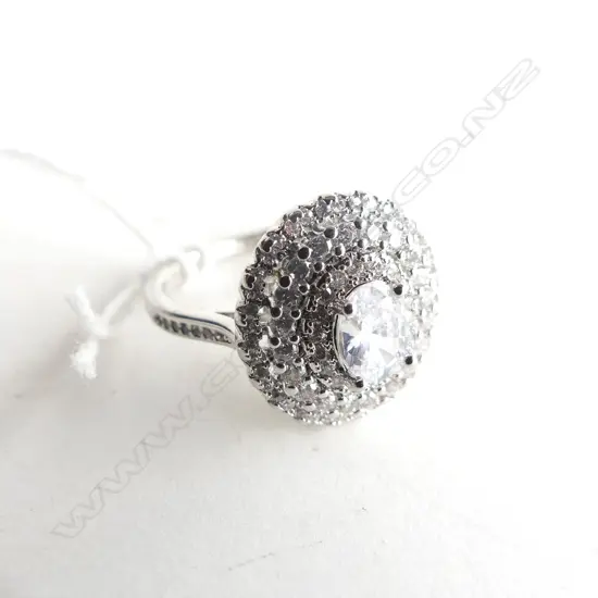 FAUX DIAMOND TRIPLE HALO RING IN SILVER COLOUR