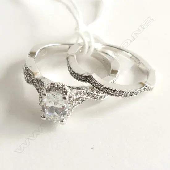 2 925 SILVER & CZ RINGS; 1 CZ SCALLOPED WEDDER + WOVEN BAND WITH LG CZ