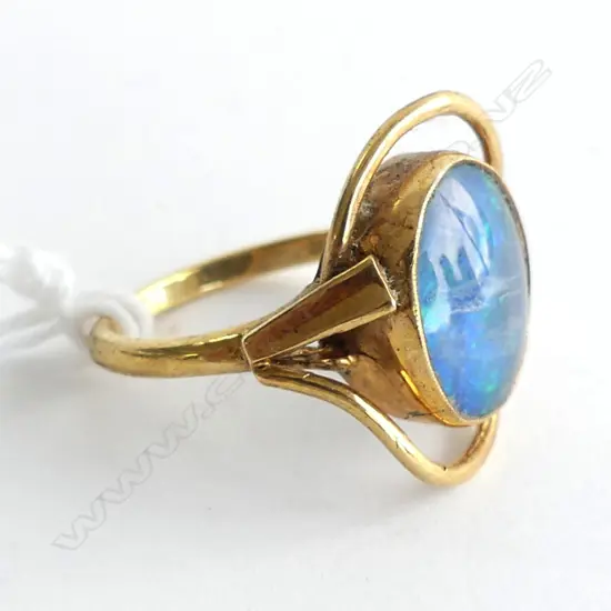 9CT GOLD RING OPAL DOUBLET PANEL SCROLLING FRAME 3.47gms