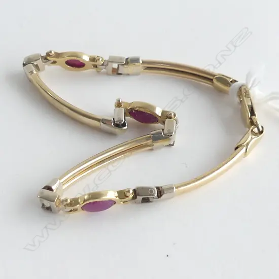 18CT AND 9CT GOLD AND RUBY BRACELET 12.2gm