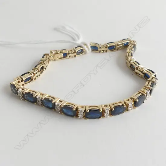 9CT GOLD SAPPHIRE AND DIAMOND TENNIS BRACELET 13.1gm