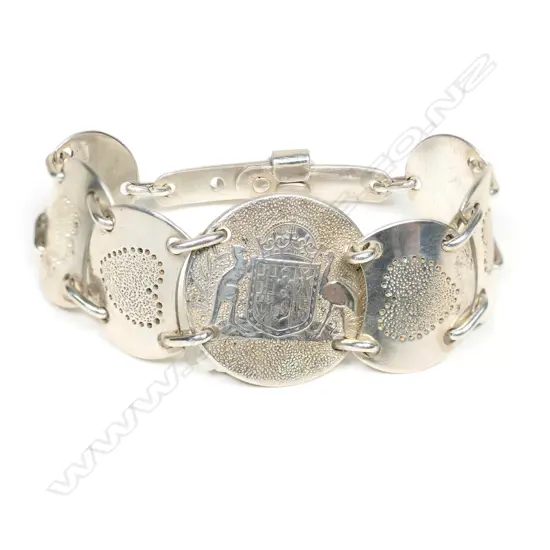 A vintage silver folk art handmade florin bracelet,