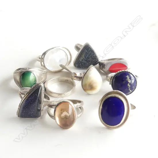 10 STG RINGS 64 GRAMS