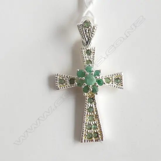 SILVER  COLOUR AND LOW GRADE EMERALD CROSS