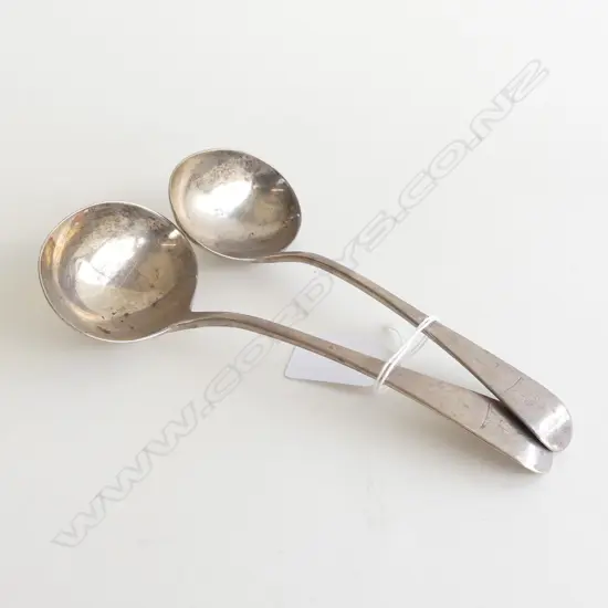 A pair of William IV silver sauce ladles,